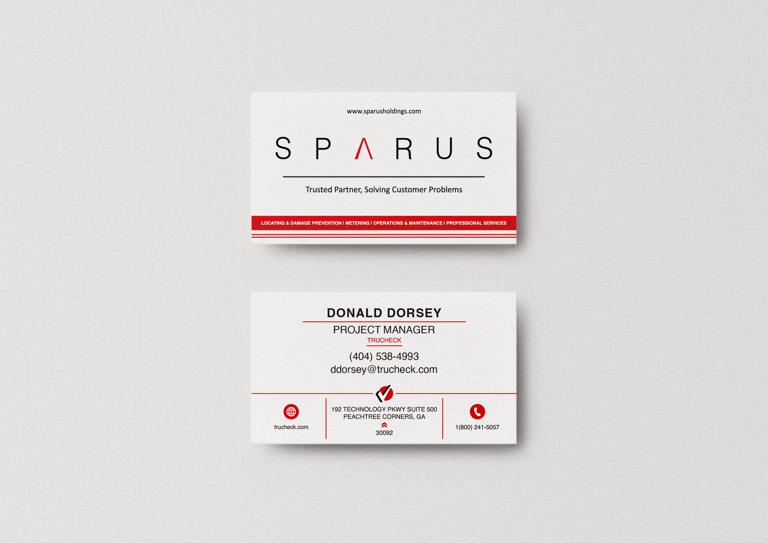TruCheck branded business card mockup featuring clean utility industry branding and professional identity design.